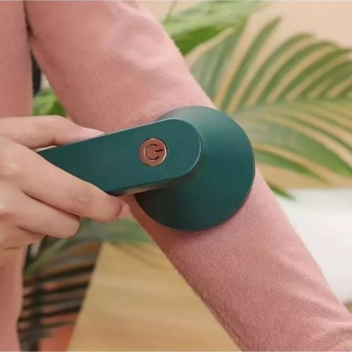 Electric lint remover for clothes designed to refresh sweaters, shirts, blankets, and other fabrics.