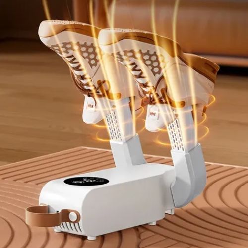 Compact footwear dryer with gentle uniform heat for drying moisture from shoes and sneakers.