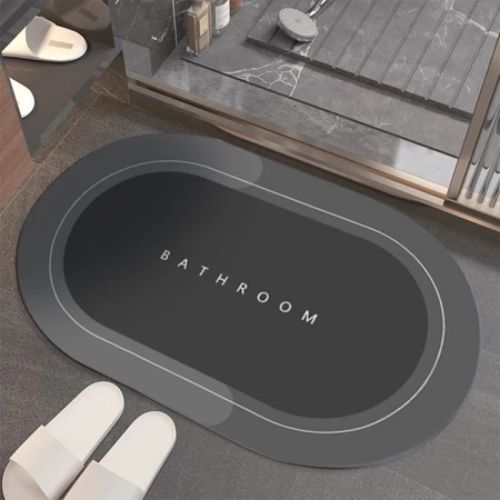 Quick-dry bath mat that absorbs moisture quickly and helps keep bathroom floors dry.