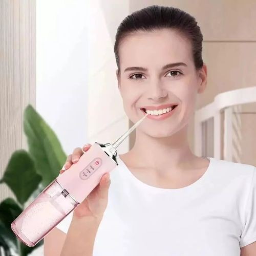 220ml portable water flosser designed for convenient cleaning between teeth and along the gumline.