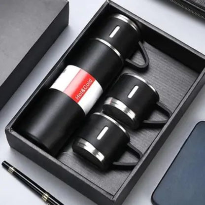 Portable 500ml thermal flask with three matching cups for coffee, tea, or water on the go.
