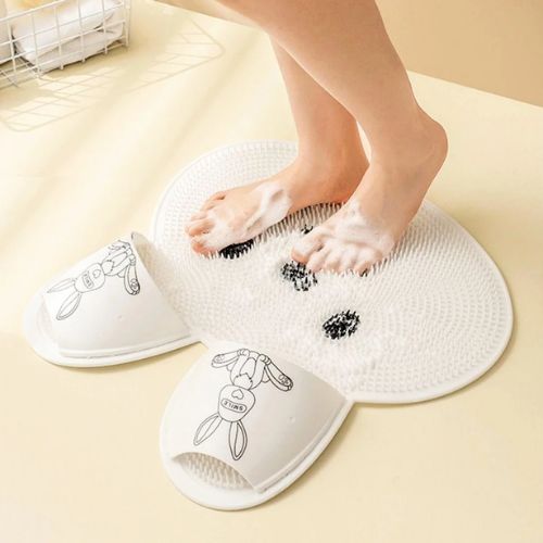 BunnyClean silicone bath mat with built-in foot scrubbers for convenient foot cleaning in the shower.