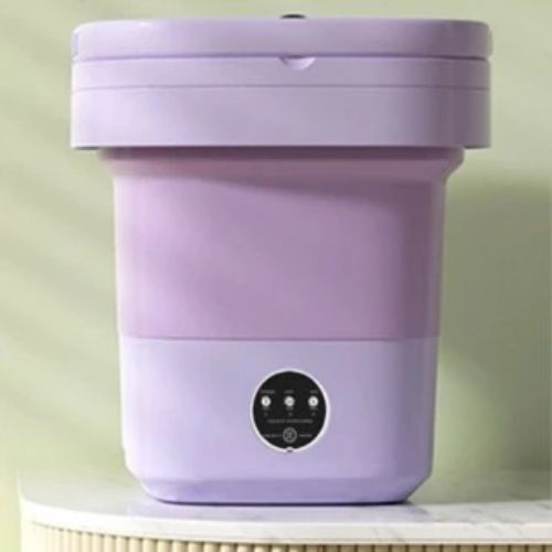 Compact mini washing machine ideal for washing small loads of clothes in limited spaces.