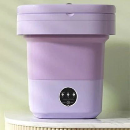 Compact mini washing machine ideal for washing small loads of clothes in limited spaces.