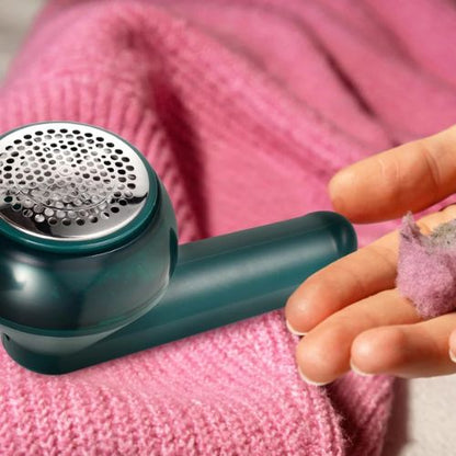 Fabric shaver for blankets and upholstery that helps remove lint, fuzz, and pilling from larger fabrics.