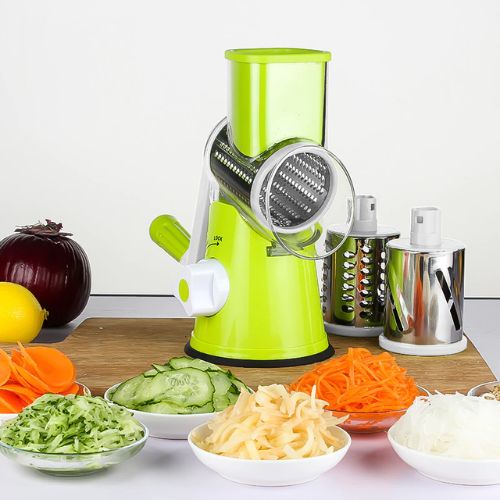 Manual vegetable slicer and grater with three stainless steel blades for versatile food preparation.