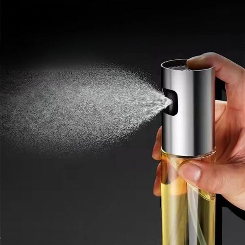 Oil spray bottle for cooking that helps distribute oil evenly over pans, cookware, and ingredients.