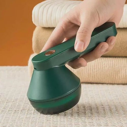 Rechargeable fabric shaver and lint remover for removing lint, fuzz, and fabric pills from clothing.