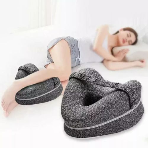 SleepAlign Pro ergonomic leg pillow with support strap for comfortable leg positioning during sleep.