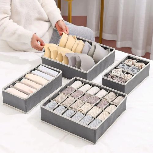 SpaceMax 4-piece drawer organizer set for neatly arranging clothing, accessories, cosmetics, and household items.