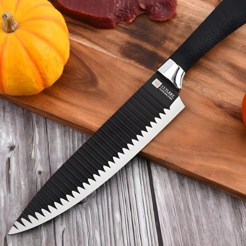 Stainless steel cooking knife set with multiple blade styles for different kitchen preparation tasks.