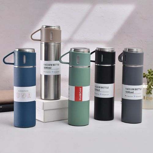 500ml stainless steel vacuum insulated bottle with three cups for hot and cold beverages.