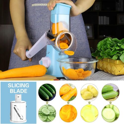 Stainless steel vegetable grater with multiple blade options for preparing fresh kitchen ingredients.