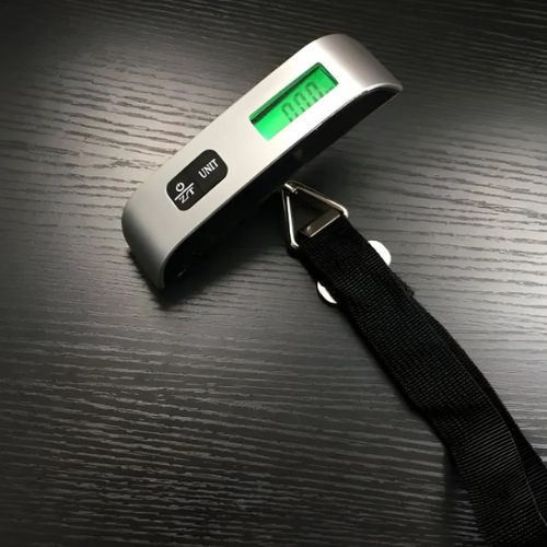 Travel bag digital scale with an easy-to-read display for convenient weight measurement on the go.