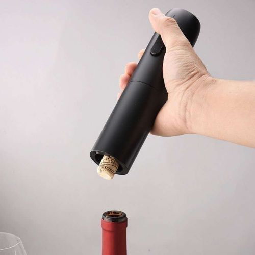 Electric wine opener with vacuum wine stopper designed to help preserve wine after opening.