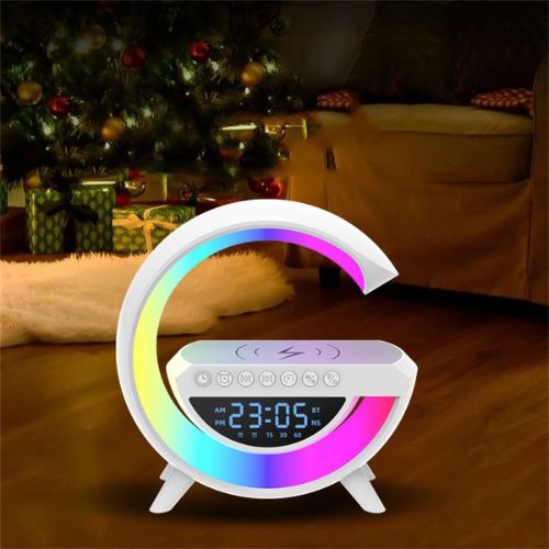 Wireless charging bedside speaker with ambient lighting and convenient digital clock display.